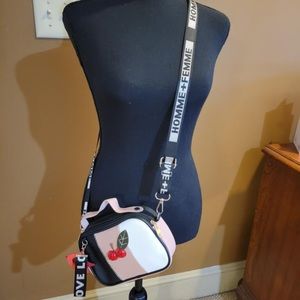 Cute bag easy to carry on the go and it NEWWW